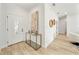 Bright entryway with a console table and modern decor at 1608 Airmont Ave, Deltona, FL 32725