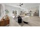 Open living space showcasing modern kitchen and dining area at 1608 Airmont Ave, Deltona, FL 32725