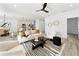 Open concept living and kitchen area with modern design at 1608 Airmont Ave, Deltona, FL 32725