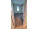 Simple bedroom with grey carpet and window at 1706 Chatsworth Cir, Saint Cloud, FL 34771