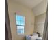 Laundry room with washer, dryer and shelving at 1706 Chatsworth Cir, Saint Cloud, FL 34771