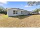 House exterior showcasing backyard with trampoline at 1780 Sw 168Th Loop, Ocala, FL 34473