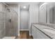 Double vanity bathroom with granite countertops and a large walk-in shower at 1780 Sw 168Th Loop, Ocala, FL 34473
