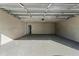 Spacious garage with an open layout and painted floor at 1780 Sw 168Th Loop, Ocala, FL 34473