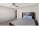 Cozy bedroom with a double bed, carpeted floor and an adjacent bathroom at 1914 Summer Serenity Dr, Kissimmee, FL 34744