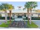 Community clubhouse with palm trees at 1914 Summer Serenity Dr, Kissimmee, FL 34744