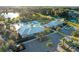 Aerial view of community pool and clubhouse with parking at 1914 Summer Serenity Dr, Kissimmee, FL 34744
