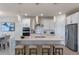 Bright kitchen featuring white cabinets and a large island at 1914 Summer Serenity Dr, Kissimmee, FL 34744