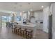 Modern kitchen with white cabinets, quartz countertops, and stainless steel appliances at 1914 Summer Serenity Dr, Kissimmee, FL 34744