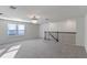 Spacious loft area with carpeted floor and chandelier at 1914 Summer Serenity Dr, Kissimmee, FL 34744