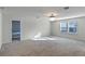 Loft with window, chandelier and view into bedroom at 1914 Summer Serenity Dr, Kissimmee, FL 34744