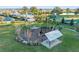 Community playground with play structures and shaded seating at 1914 Summer Serenity Dr, Kissimmee, FL 34744