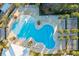 Aerial view of a community pool with surrounding lounge chairs at 1914 Summer Serenity Dr, Kissimmee, FL 34744