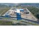 Aerial view of a new school building under construction at 1914 Summer Serenity Dr, Kissimmee, FL 34744