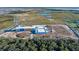 Aerial view of a new school building under construction at 1914 Summer Serenity Dr, Kissimmee, FL 34744