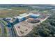 Aerial view of a new school building under construction at 1914 Summer Serenity Dr, Kissimmee, FL 34744