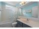 Bathroom with shower/tub combo, vanity, and a mirror at 2038 Winding Oaks Dr, Orlando, FL 32825