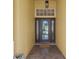 Elegant front door entry with a glass insert and tiled flooring at 2038 Winding Oaks Dr, Orlando, FL 32825