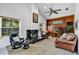 Comfortable living room with a marble fireplace, comfortable seating, and a TV at 2376 Park Village Pl, Apopka, FL 32712
