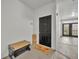 Apartment entry with a black door and welcome mat at 239 Longview Ave # 216, Celebration, FL 34747
