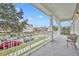 Private balcony overlooking a community street and parking at 239 Longview Ave # 216, Celebration, FL 34747