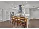 Modern kitchen with white cabinets, quartz countertops, and a large island at 239 Longview Ave # 216, Celebration, FL 34747