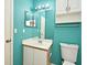 Bathroom with bright blue paint, toilet, and vanity at 2572 Robert Trent Jones Dr # 1231, Orlando, FL 32835