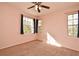 Bright bedroom with neutral walls and carpeting at 2572 Robert Trent Jones Dr # 1231, Orlando, FL 32835