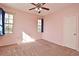 Bedroom with neutral walls, carpeting, and ceiling fan at 2572 Robert Trent Jones Dr # 1231, Orlando, FL 32835