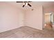 Spacious bedroom with neutral walls, carpet, ceiling fan, and ample closet space at 2572 Robert Trent Jones Dr # 1231, Orlando, FL 32835