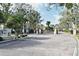 Brick paver road leads to gated community entrance at 2572 Robert Trent Jones Dr # 1231, Orlando, FL 32835