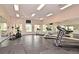 Community fitness center with treadmills and an elliptical machine at 2572 Robert Trent Jones Dr # 1231, Orlando, FL 32835