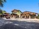 Community shopping area with covered seating offers convenient options for residents at 26812 Augusta Springs Cir, Leesburg, FL 34748