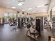 Well-equipped gym offers modern weight training machines, treadmills, and stationary bikes at 26812 Augusta Springs Cir, Leesburg, FL 34748