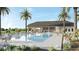 Resort-style pool with lounge chairs and covered patio area at 2769 Flushing Dr, Apopka, FL 32703