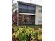 View of the condo's backyard with landscaping at 3017 Cottage Grove Ct # Ge, Orlando, FL 32822
