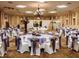 Elegant banquet hall with tables, chairs, and decorations at 3017 Cottage Grove Ct # Ge, Orlando, FL 32822