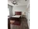 Spacious bedroom with wood flooring and a large dresser at 3017 Cottage Grove Ct # Ge, Orlando, FL 32822