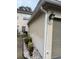 Townhouse exterior showcasing attached garage and building details at 3017 Cottage Grove Ct # Ge, Orlando, FL 32822