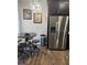 Eat-in kitchen with stainless steel appliances and breakfast bar at 3017 Cottage Grove Ct # Ge, Orlando, FL 32822
