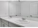 Elegant bathroom featuring dual sinks, sleek countertops, and modern fixtures at 307 River Front Way, Edgewater, FL 32141