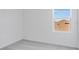 Bedroom features plush carpeting and a window providing natural light at 307 River Front Way, Edgewater, FL 32141