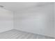 A clean and comfortable bedroom featuring neutral colors and plush carpeting at 307 River Front Way, Edgewater, FL 32141