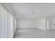 Bright living room with tile flooring and large windows at 307 River Front Way, Edgewater, FL 32141