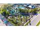 Aerial view of resort amenities including pools, mini golf, and clubhouse at 3937 Lana Ave, Davenport, FL 33897