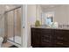 Bathroom with shower, vanity, and granite countertop at 3937 Lana Ave, Davenport, FL 33897