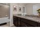 Double vanity bathroom with granite countertop at 3937 Lana Ave, Davenport, FL 33897