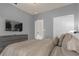 Bedroom with queen bed and TV at 3937 Lana Ave, Davenport, FL 33897