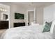 Bright bedroom with king bed and en-suite bathroom at 3937 Lana Ave, Davenport, FL 33897