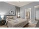 Spacious bedroom with ensuite bathroom and neutral decor at 3937 Lana Ave, Davenport, FL 33897